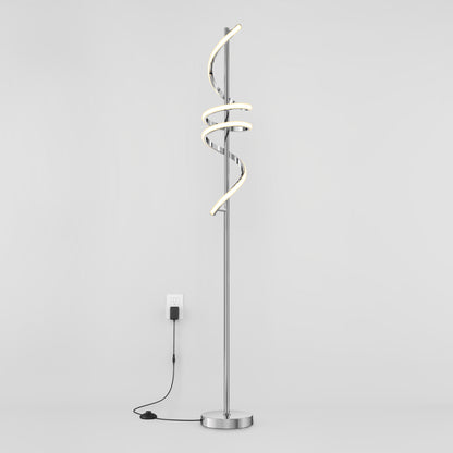 The Artika Coda modern LED floor lamp 5CCT features a spiral design, dimmable lighting, and stands on a round base with a visible black cord and switch, shown plugged in against a plain white background.