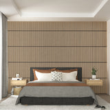 Modern bedroom with a wood slat accent wall, low bed with gray and brown bedding, a white pillow with black stars, two matching nightstands, a potted plant, curtains, and a light gray rug.