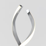 A modern lamp with two curved, metallic arms featuring integrated LED light strips, twisting upward in a spiral shape against a plain grey background.