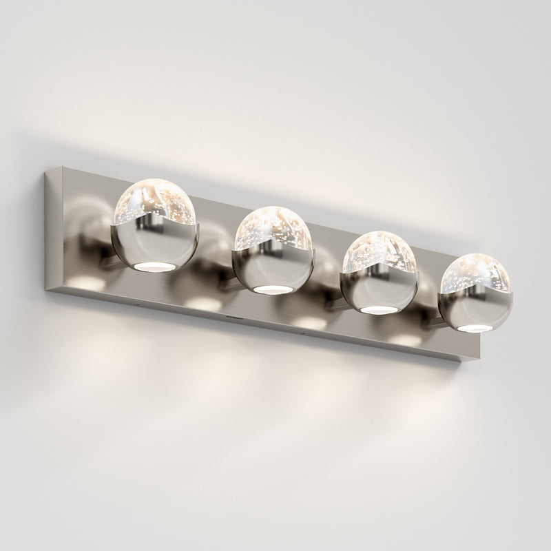 The Artika Oracle 4 light LED bathroom vanity light features 4 glass globes on a sleek base, perfect for modern bathrooms.
