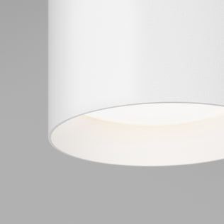 Minimalist close-up of the Artika Radius LED flush mount light 3 CCT, softly illuminated against a plain light gray background. Adjustable color-balance lets you customize your room’s ambiance.