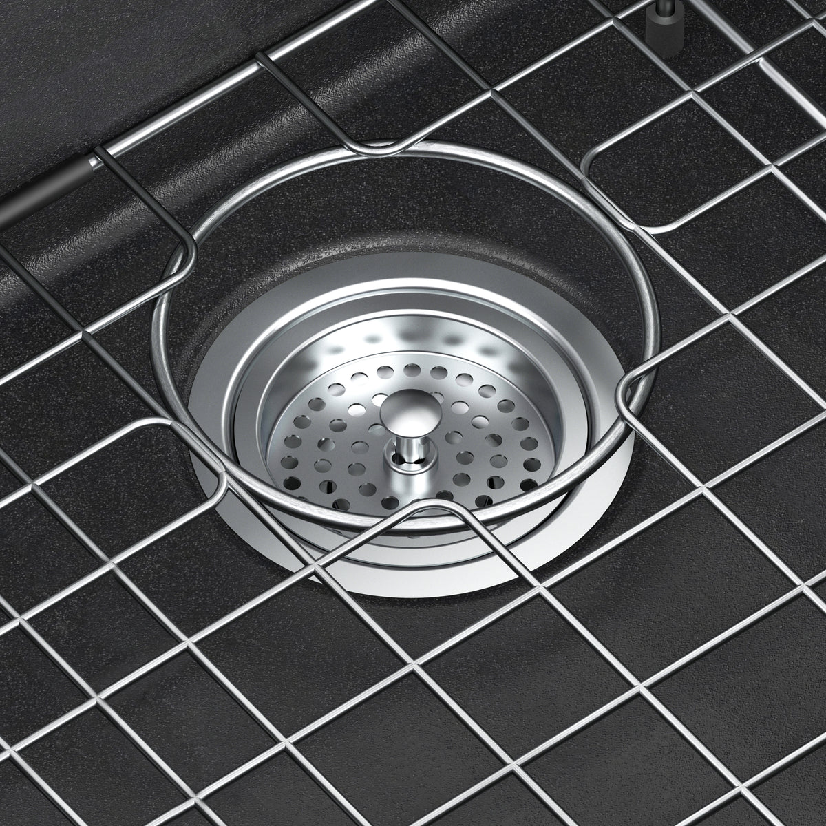 Close-up of Artika Baycrest 33 in. Black Single Bowl Sink with metal strainer and grid cover inside the basin.