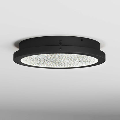 Artika Glitter 14 in. LED flush mount ceiling light, round black design with a textured, illuminated surface on a white ceiling.