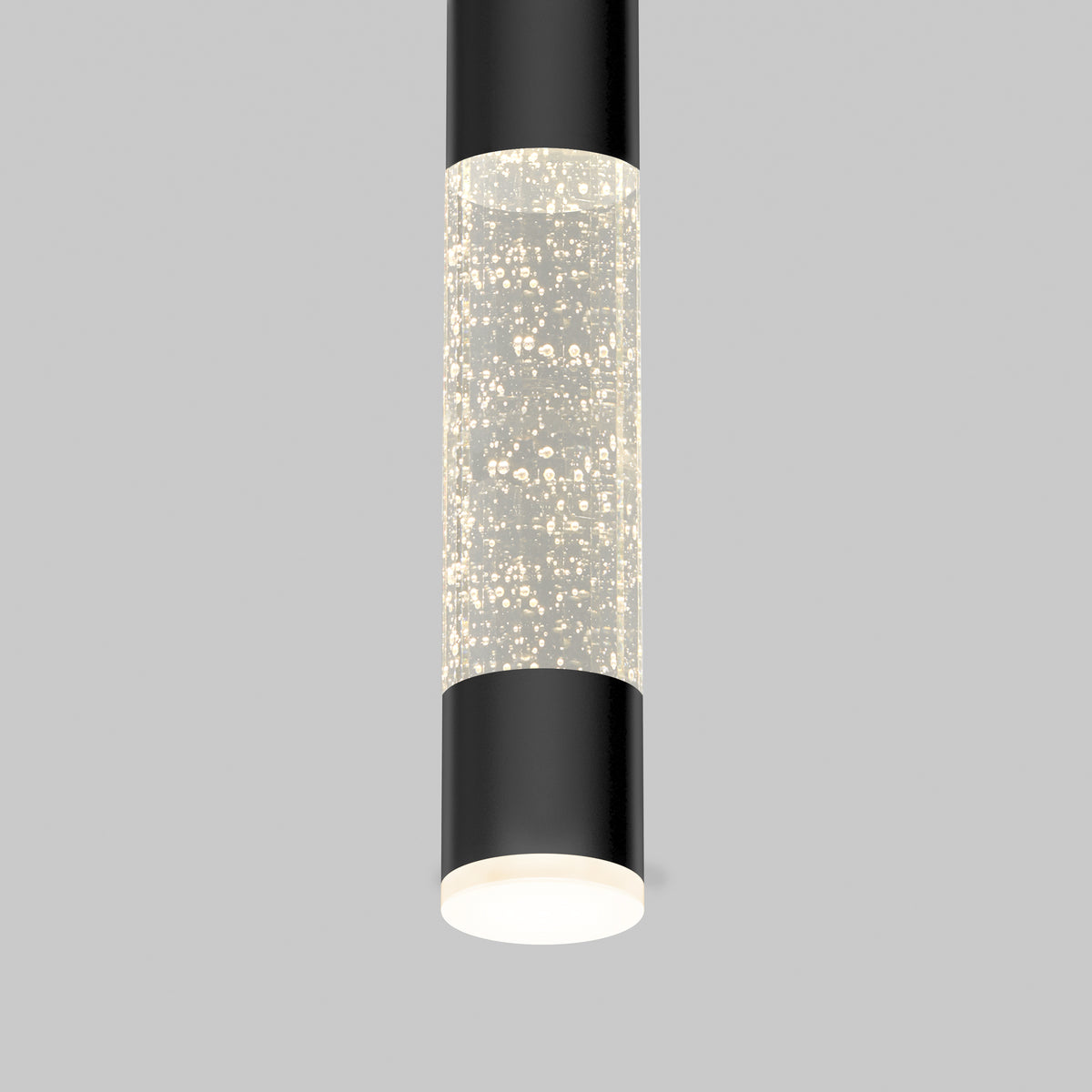 A modern cylindrical ceiling light with black ends and a central section filled with illuminated bubbles, set against a plain gray background.