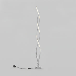 The Swirl modern LED floor lamp by Artika features two curved, intertwined LED light strips on a square metal base with a visible power cord and foot switch, displayed against a plain gray background.