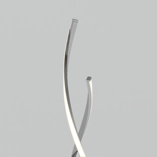 The Artika Swirl modern LED floor lamp features two sleek, metallic, curved rods that intersect and twist upward against a plain light gray background, with one rod emitting a soft white light along its edge.