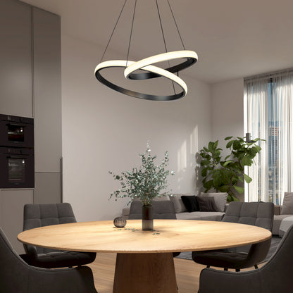Modern dining with Mora 28″ LED Pendant by Artika, gray chairs, round wood table, plant; features adjustable 5CCT color temperature.