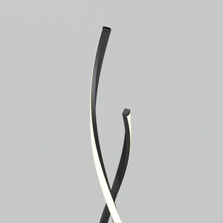 The Swirl modern LED floor lamp by Artika features intersecting black curves and a soft white glow—ideal for any modern living room.