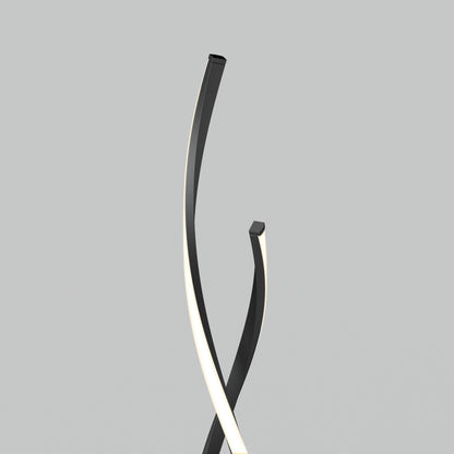 The Swirl modern LED floor lamp by Artika features intersecting black curves and a soft white glow—ideal for any modern living room.
