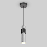 The Artika Barden 1-light LED pendant features a modern cylindrical design with a concrete finish, suspended by a slim black cord against a plain light gray background.
