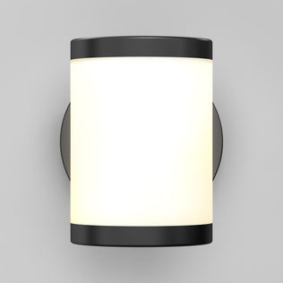 Artika’s Landon LED Outdoor Wall Light 2-Pack features black metal edges and a frosted diffuser, shown on a light gray wall.
