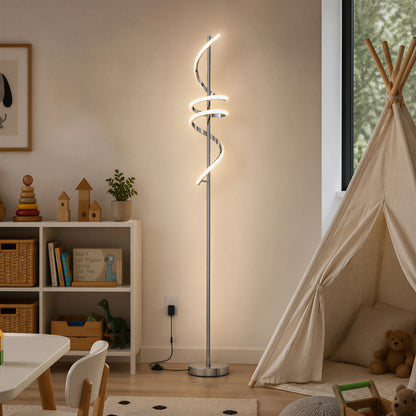 Artika Coda modern LED floor lamp 5CCT, dimmable, lighting up a cozy kids’ playroom with shelves, toys, and a fabric play tent.