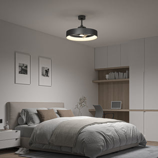A modern bedroom with a neatly made bed, neutral bedding, wall art, a small nightstand, built-in desk and shelves, chair, and the Artika Austin 23 in. LED modern ceiling fan with remote. The decor is minimalist.