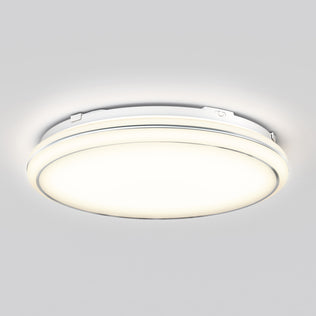 The Artika Emina 13 in. LED flush mount light features a modern round design with a white frame; mounted on a light gray ceiling, it emits a soft, even glow and offers 3 selectable color temperatures (CCT).