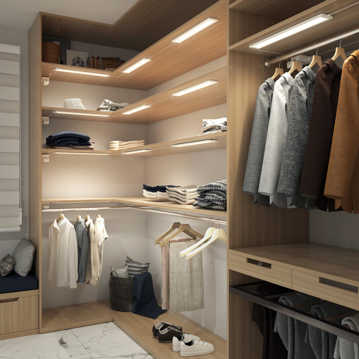 A modern walk-in closet with wooden shelves and hanging rods, neatly organized with folded clothes, jackets, shirts, baskets, and storage boxes under bright built-in lights.