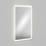 A rectangular wall-mounted mirror with a glowing LED light border, set against a plain gray background. The mirror has touch controls visible near the bottom left corner.
