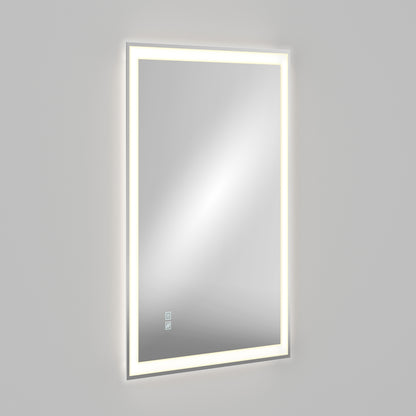 The Artika Sofia LED mirror 3 CCT with defogger is a rectangular wall-mounted mirror featuring an illuminated LED border and touch sensor icons near the bottom left, shown against a plain gray background.