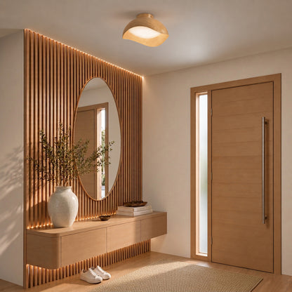 Adara 15 in. (38 cm) Modern LED Flush Mount Ceiling Light 5 CCT, a dimmable, dome-shaped fixture with a wood-grain finish in a modern entryway.