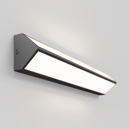 The Artika Preston LED modern bathroom vanity light 3 CCT, featuring a black frame and frosted white diffuser, is wall-mounted on a plain light gray wall.