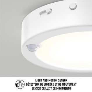 Close-up of Artika Accent under cabinet LED light 3CCT with built-in sensor. Text reads: Light and motion sensor / Détecteur de lumière et de mouvement / Sensor de luz y de movimiento, with a hand and waves icon.