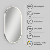 Oval wall-mounted mirror with integrated LED lighting is shown on the left. On the right, icons and text highlight features: dimmable, 50,000 hours, 1200 lumens, defogger, and selectable white technology.