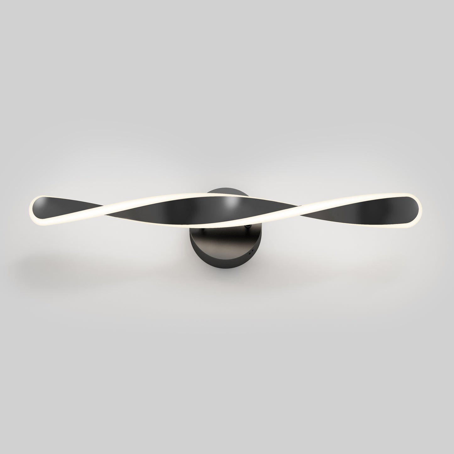 The Artika Finley LED modern bathroom vanity light 3 CCT is a wall-mounted fixture featuring a twisted black and white ribbon design on a round black base, shown against a plain light gray background.