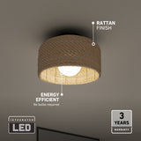 A ceiling light fixture with a rattan finish glows warmly. Labels highlight its integrated LED, energy efficiency (no bulbs required), and a 3-year warranty. The light is mounted on a white ceiling.