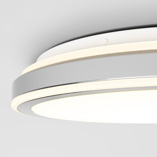 Close-up view of the Artika Altitude 15 in. LED modern flush mount light featuring a sleek, layered design and 5 adjustable color temperatures, mounted on a plain white ceiling.