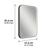Rectangular wall mirror with rounded corners, measuring 81.4 cm (32.05 in) in height and 61.4 cm (24.17 in) in width. The mirror has a dark frame and three touch buttons on the bottom left.