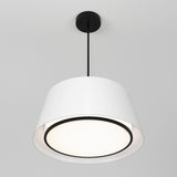 A modern ceiling pendant light with a wide, white lampshade, black trim, and a black cord, hanging from a black ceiling mount against a plain white background.