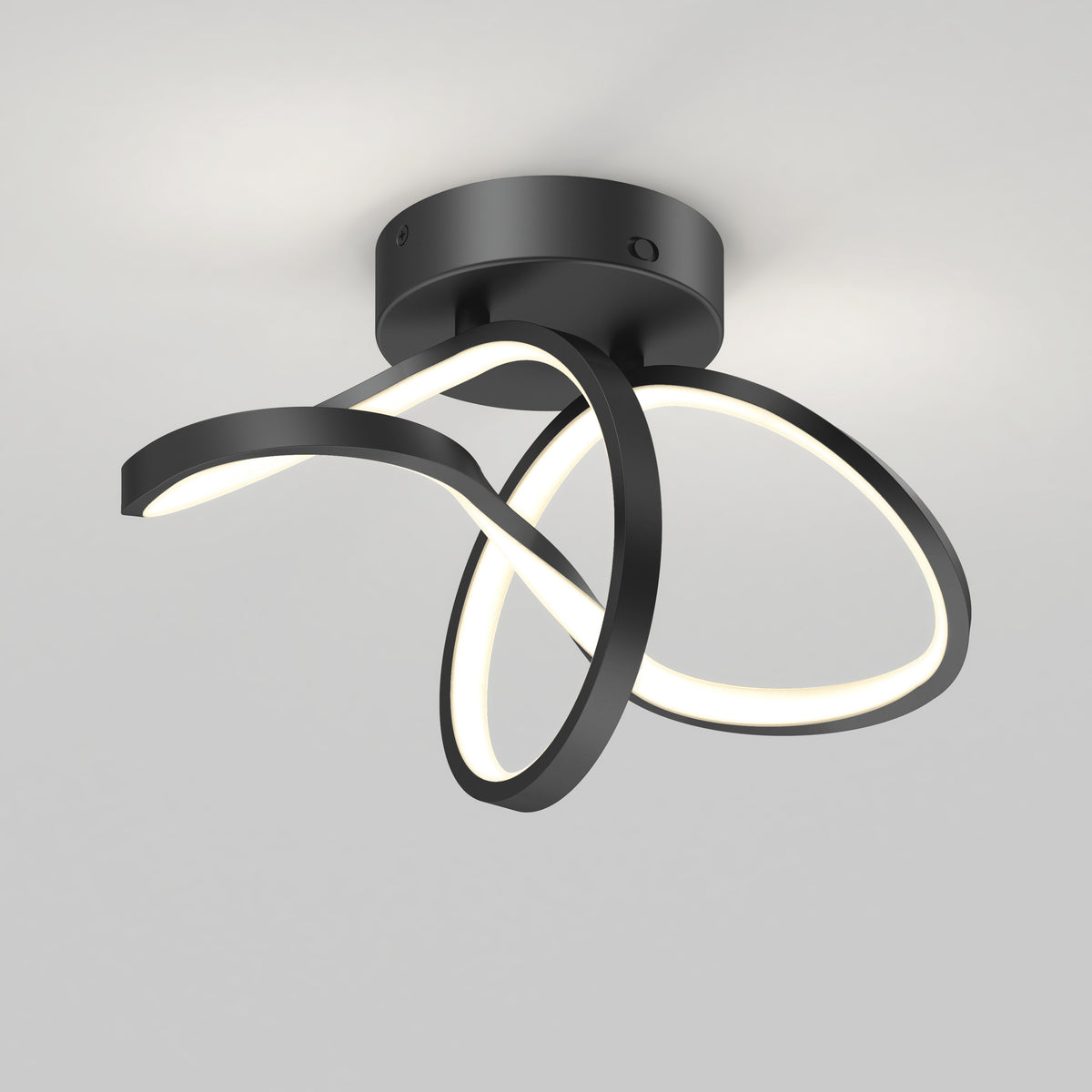 A modern ceiling light fixture with three curved, black metal arms, each lined with integrated LED lights, creating an abstract, flowing design against a plain white ceiling.