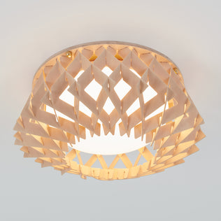 The Artika Kiran 13 in. modern LED flush mount light features a geometric wooden lattice design around a round white light, offering 5 CCT options and mounting seamlessly on a white ceiling.