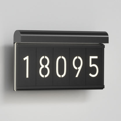 The Artika Bowen modern LED outdoor address wall light (5 CCT) displays illuminated house numbers 18095 on a light gray wall, offering a stylish and contemporary look to your home's exterior.