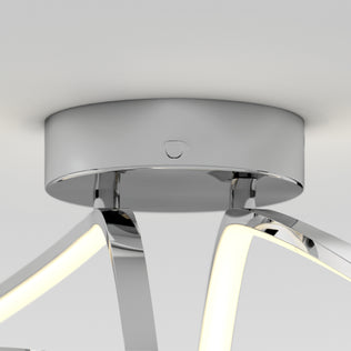 Close-up of Artika’s Loop modern LED flush mount light with curved, dimmable arms and a round base, featuring 3 CCT settings.