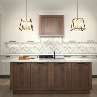 Modern kitchen with dark wood cabinets, marble island, geometric backsplash, and an Artika Carter Square 4-light chandelier above the island.