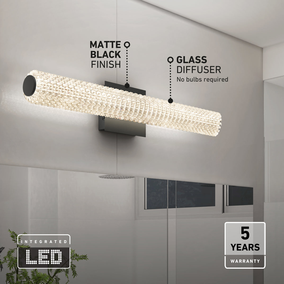 A modern wall light with a matte black finish and glass diffuser is mounted above a bathroom mirror. Text highlights its integrated LED, 5-year warranty, and feature of no bulbs required.
