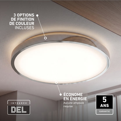 The Artika Isara 12 in. RGBIC LED ceiling light with interchangeable trim is mounted, showing energy-saving and 5-year warranty labels.